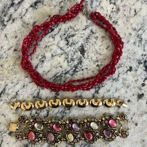 Bundle of vintage costume jewelry, red beaded necklace and two bracelets